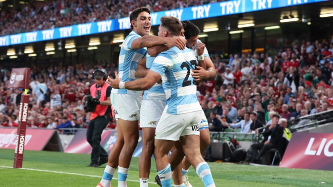 Santiago Cordero of Argentina celebrates with teammates after scoring the team's third try during the 1888 Cup international match against the British and Irish Lions in Dublin. Photo / Getty Images