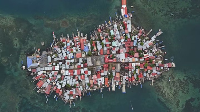 Buildings cover Gardi Sugdub Island, part of San Blas archipelago off of Panama's Caribbean coast. Due to rising sea levels, about 300 Guna Indigenous families are set to relocate to new homes built by the government, on the mainland. Photo / AP