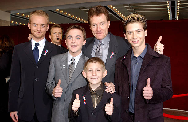 The cast of "Malcolm In The Middle" give a thumbs up sign at the 53rd Annual Primetime Emmy Awards at the Shubert Theater November 4, 2001 in Los Angeles, CA. (L-R) Actors Christopher Masterson, Frankie Muniz, Erik Per Sullivan (front center), Bryan Cranston and Justin Berfield. (Photo by Vince Bucci/Getty Images)