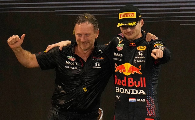 Red Bull team chief Christian Horner celebrates with his driver Max Verstappen. (Photo / AP)