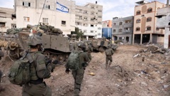 Israeli soldiers take part in a ground operation in Gaza City's Shijaiyah neighborhood on December 8. Photo / AP, Moti Milrod, Haaretz