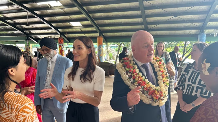 Prime Minister Christopher Luxon and wife Amanda talking to university students in Fiji. Photo / Adam Pearse