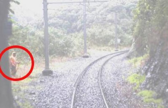 CCTV showing track workers coming into view as train exits tunnel 5. Photo / Supplied