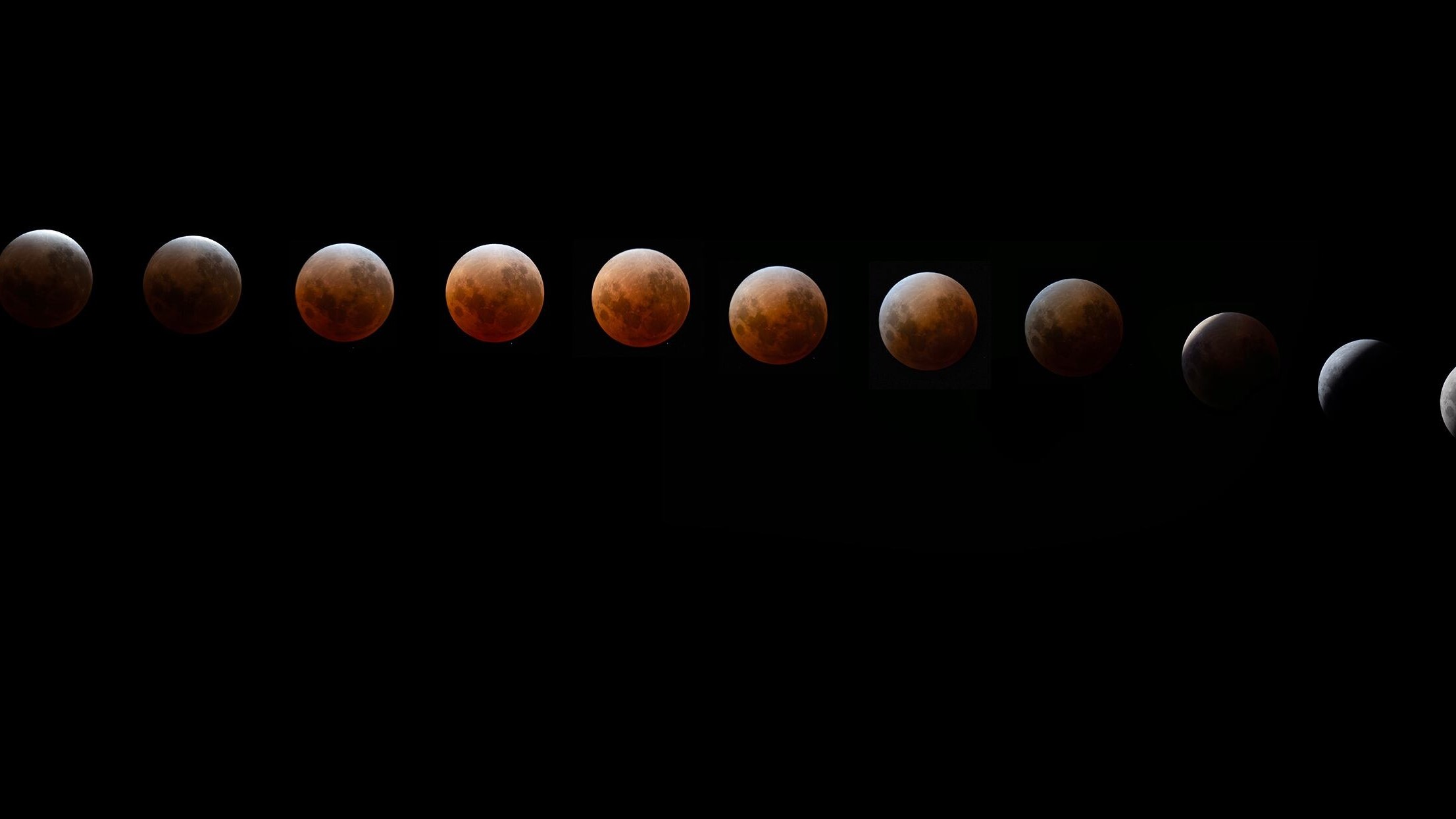 In pictures: Rare 'blood moon' turns night sky copper-red across the country