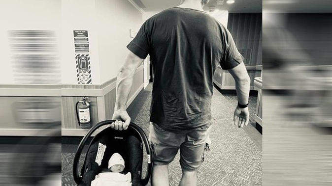 Former All Black Richie McCaw with baby Grace. (Photo / via Facebook)