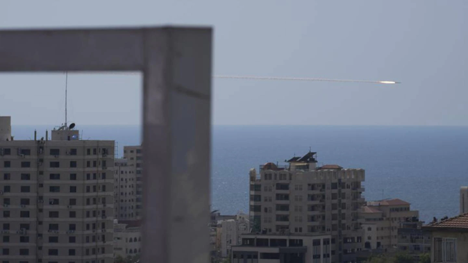 A rocket is launched from the Gaza Strip towards Israel, in Gaza City. Photo / AP