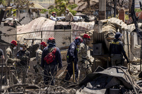 Search and rescue team members work in the area devastated by a wildfire in Lahaina, Hawaii, Thursday, Aug. 17, 2023. The blazes incinerated the historic island community of Lahaina and killed more than 100 people. Photo / AP