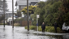 Flooding in New Brighton, Christchurch. Photo / George Heard