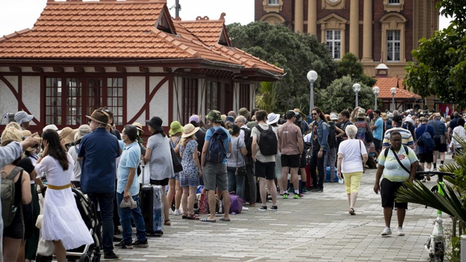 Massive queues waiting to catch the ferry to Waiheke Island from Auckland City. Photo / Dean Purcell