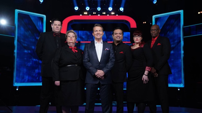 The stars of 'The Chase': Mark "The Beast" Labbett, Anne "The Governess" Hegerty, host Bradley Walsh, Paul "The Sinnerman" Sinha, Jenny "The Vixen" Ryan and Shaun "The Dark Destroyer" Wallace. Photo / TVNZ