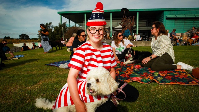 Tessa Renshaw, 9, with Molly from Napier wine dogs event at Elephant Hill. Photo / Paul Taylor