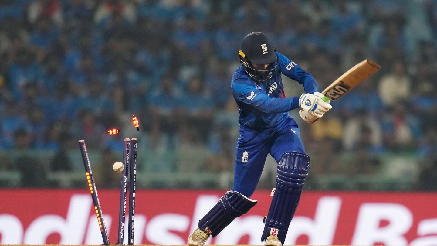 England's Adil Rashid is bowled out by India's Mohammed Shami. (Photo / AP)