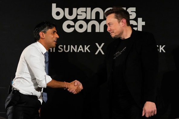 Britain's Prime Minister Rishi Sunak, left, shakes hands with Tesla and SpaceX's CEO Elon Musk after an in-conversation event in London, Nov. 2. (Photo / AP)