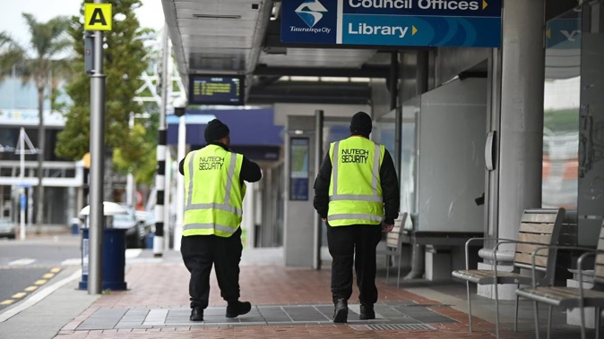 Security officers pictured in 2021 at Tauranga's main CBD bus interchange on Willow St. Photo / George Novak