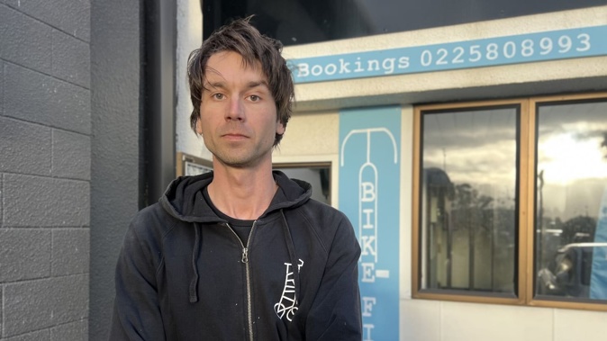 Harry van der Zanden at his mobile coffee and bike repair service store at Marewa shops. Photo / Rafaella Melo
