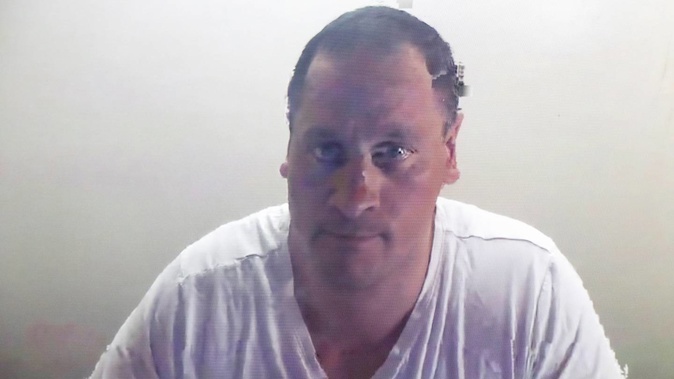 William Macfarlane appears in the High Court via audio visual link and admits running a drug dealing, importing and manufacturing syndicate. Photo / Andrew Warner