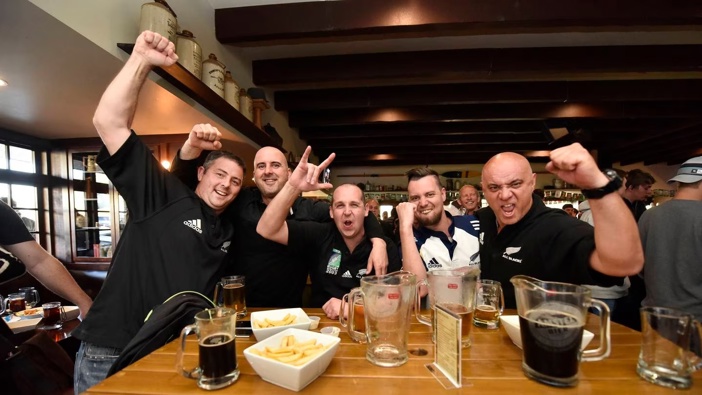 Gavin Clifford (left), Richard Moore, Tony Scott, Terry Ferguson, and Bryan Keightley relish in the All Blacks' victory from the Cornerstone Pub.