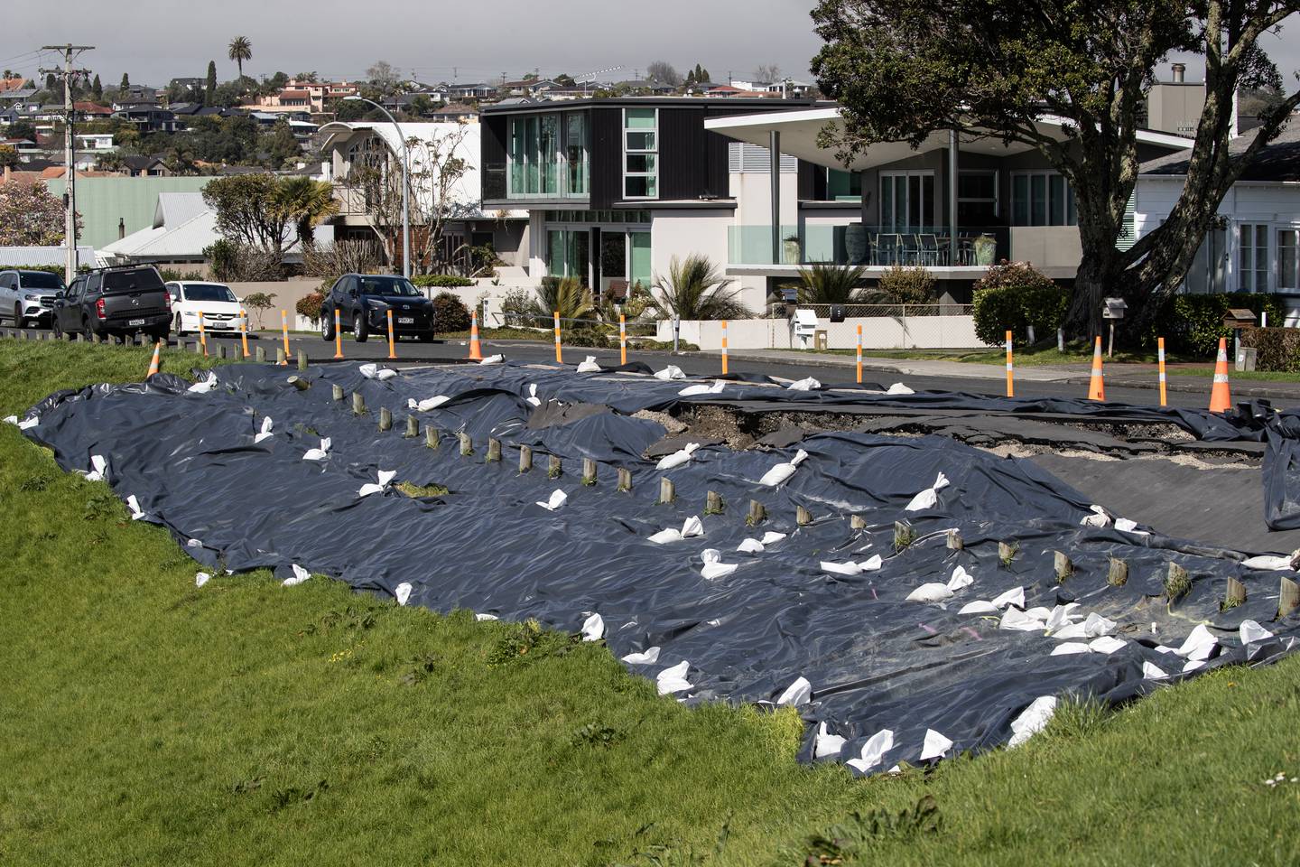 Subsidence to the road on Marine Parade in Mellons Bay. Photo / Jason Oxenham.