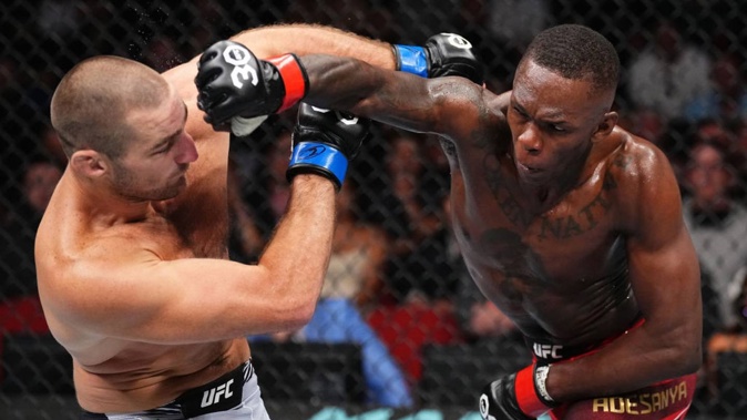 Israel Adesanya lost his UFC middleweight championship belt to Sean Strickland in Sydney on Sunday. Photo / Getty Images