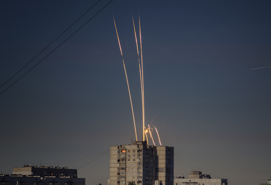 Russian rockets launched against Ukraine from Russia's Belgorod region are seen at dawn in Kharkiv, Ukraine
