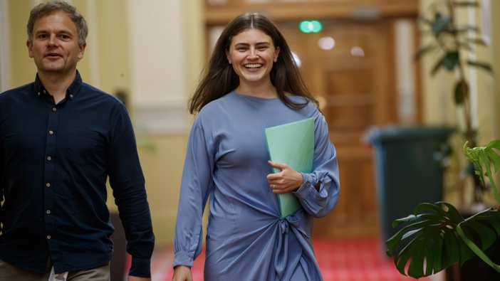 Greens MP Chlöe Swarbrick, with Director of Communications Danny Stevens, arriving for her press conference where she announcing her leadership bid, Parliament, Wellington, 02 February, 2024. Photo / Mark Mitchell