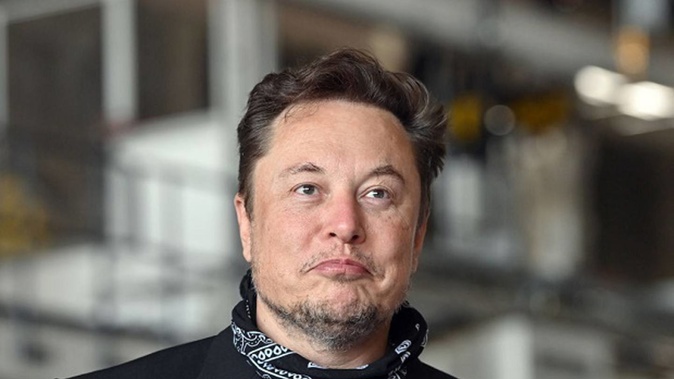 Elon Musk stands in the foundry of the Tesla Gigafactory during a press event. Photo / Getty Images