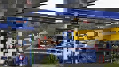 Police investigating the scene of last night's homicide at Gull service station in Raumanga. Photo / Michael Cunningham