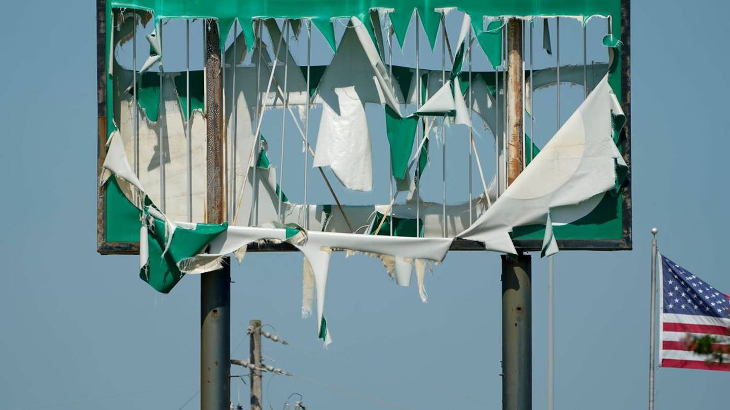 Severe weather shredded this billboard in Mississippi. Photo / AP
