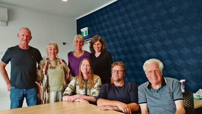 Ohiwa residents opposed to jetskis using Ohiwa Harbour are Kenny McCracken, Meg Collins, Dido Eden, Tanja Rother (standing) and Lynne Hickling, Tilmann Loewe and Stuart Slade (sitting).