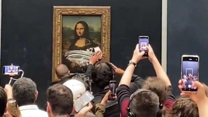 Mona Lisa was vandalised on Sunday at the Louvre in Paris. Photo / Twitter