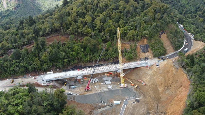 The bridge reconnecting State Highway 25A is on track to be completed and open to traffic on December 20. (Photo / Waka Kotahi)