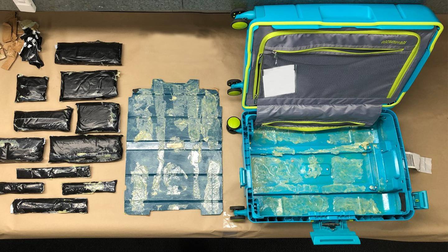 Customs found more than 2.1kg of meth hidden in a suitcase at Auckland International Airport in June. One man was arrested then, and a second man was arrested today. (Photo / Supplied)