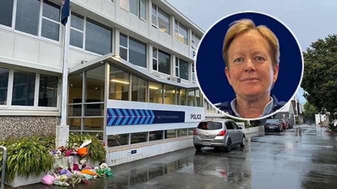 Tributes to slain police officer Senior Sergeant Lyn Fleming outside Nelson police station. Photo / Katrina Bennett