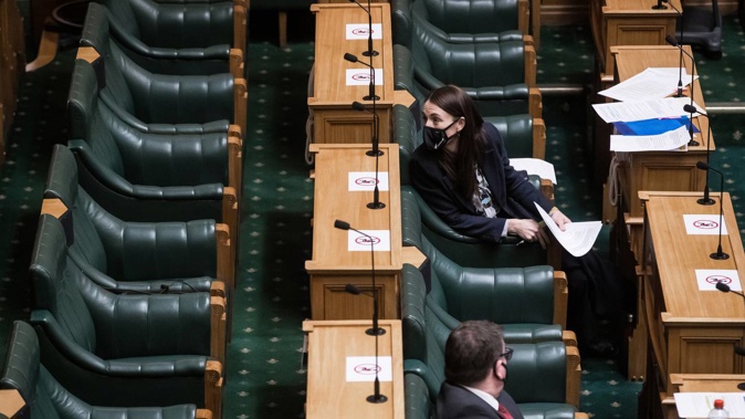 Prime Minister Jacinda Ardern in the House in alert level 4 lockdown last year. (Photo / Robert Kitchin)