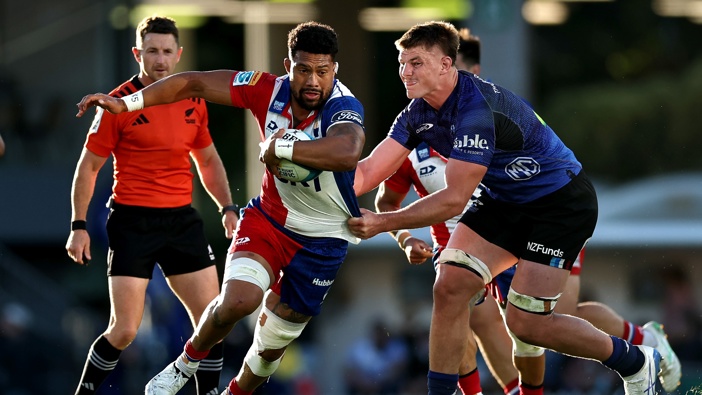 Ardie Savea of Moana Pasifika is tackled by Josh Beehre of the Blues during the round nine Super Rugby Pacific match between Blues and Moana Pasifika at Eden Park, on April 12, 2025, in Auckland, New Zealand. (Photo by Phil Walter/Getty Images)