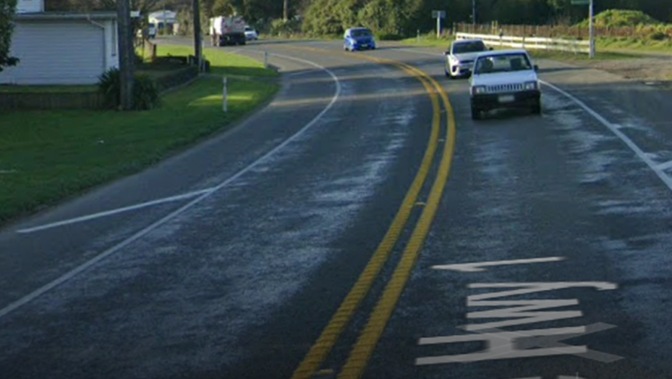 The bend on State Highway 1 at Kuku, near Levin, where two vehicles collided killing four people. (Photo / NZ Herald)