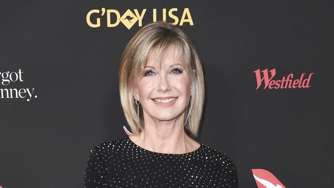 Olivia Newton-John, known for playing Sandy in Grease, died in August 2022. Photo / AP