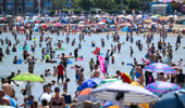 The intense high pressure has prompted the UK Health Security Agency (UKHSA) to issue rare, amber heat alerts across multiple regions due to the health risks for vulnerable people and extreme UV levels. (Photo by Finnbarr Webster/Getty Images)