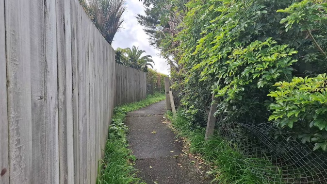 The language assistant was reportedly confronted on this walkway in Onerahi. Photo / Brodie Stone