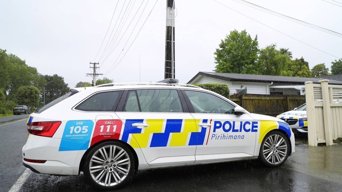 Police in Swanson attend the scene where David Keith Yates, 65, was found dead in November. Nephew James Yates was charged with murder. Photo / Hayden Woodward