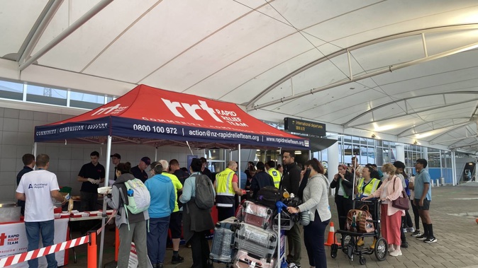 Around 100 passengers slept in Auckland Airport last night as knock-on flood disruption affects flights. Photo / Supplied, Auckland Airport