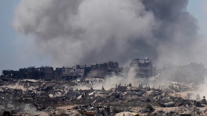 Smoke rises over Gaza after an Israeli bombardment, seen from a position on the Israeli side of the border on July 3, 2024. Photo / Getty Images