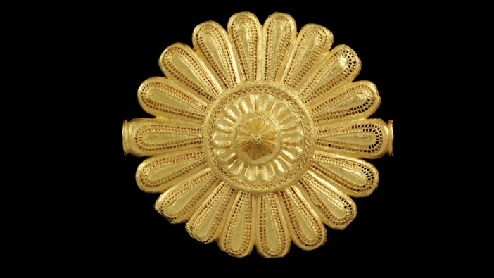 A view of a cast gold badge, worn by the Asantehene's or king's 'soul washer' as a badge of office, originating from Ghana. Photo / Victoria and Albert Museum, London via AP