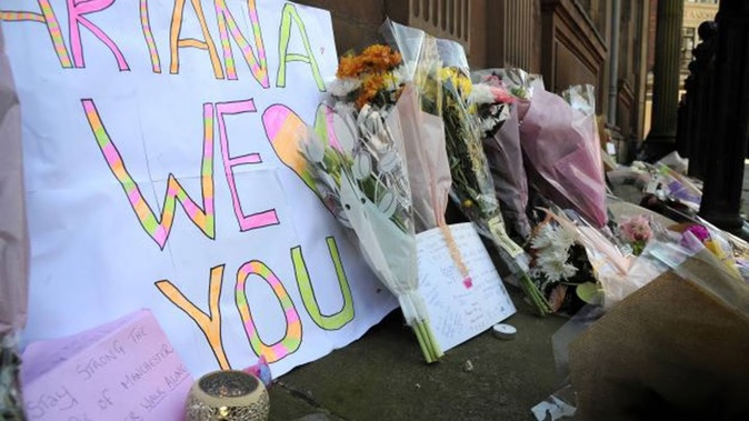 Flower tributes at St Ann's square, Manchester, England, in May 23, 2017, after a suicide bombing attack at an Ariana Grande concert at the Manchester Arena. Photo / AP file