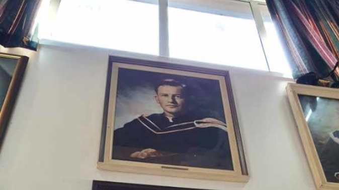 Father Patrick Minto's portrait on the wall at St Patrick's Silverstream in Upper Hutt.