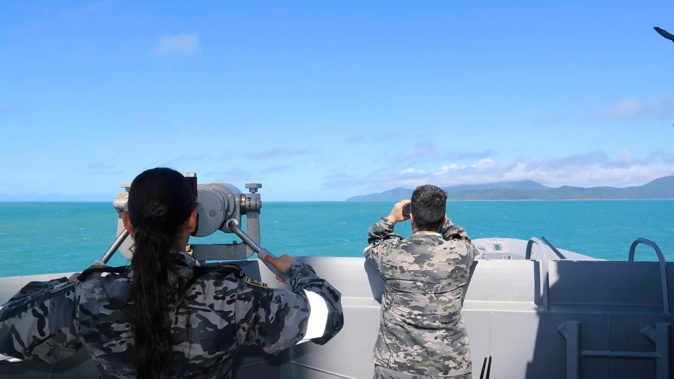 A search for an Australian army helicopter that crashed at sea with the loss of four lives last week during a military exercise with the United States has found human remains but not the black box. Photo / AP