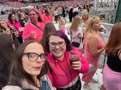 Kelly Rolton (left), and Jessie Rolton (right) at the Pink concert before Jessie broke her ankle in three places.