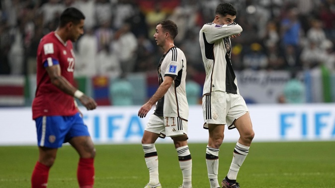 Germany's Mario Goetze and Kai Havertz react after being eliminated from the World Cup. Photo / AP