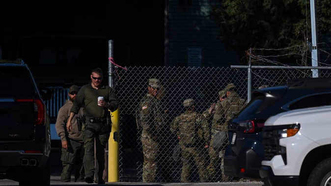 National Guard troops stand outside the Immigration and Customs Enforcement facility in Broadview, Illinois. Photo / Joshua Lott, The Washington Post