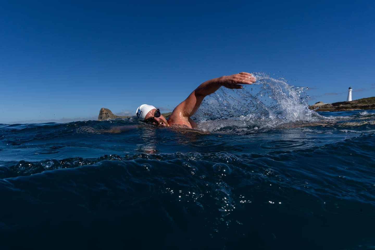 'Cold water, jellyfish and long sessions': Jono Ridler completes record breaking swim against bottom trawling 